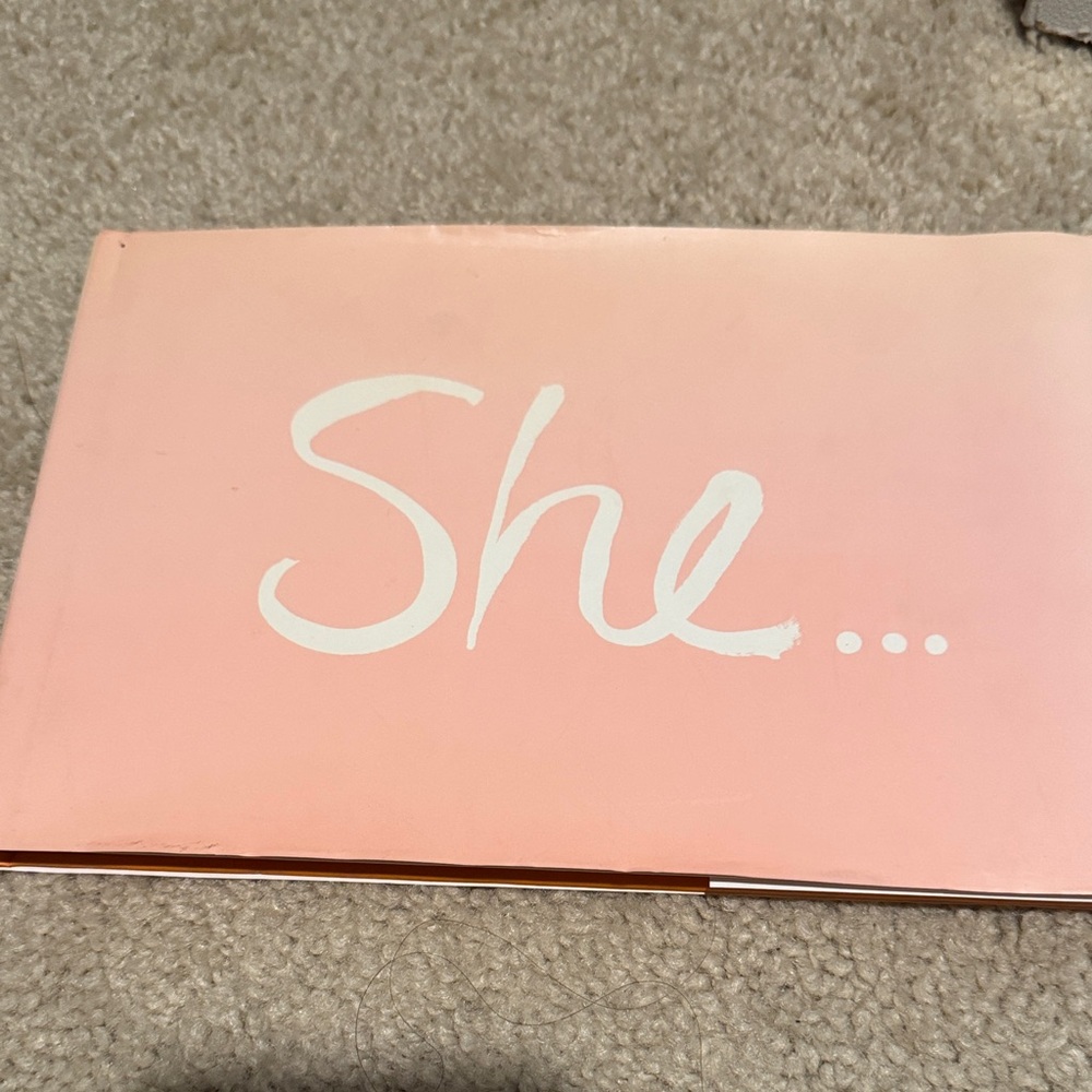 Orange and White 'She...' Book